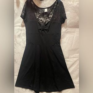 H&M Woman’s Black Lace-detailed with front bow. Sz S